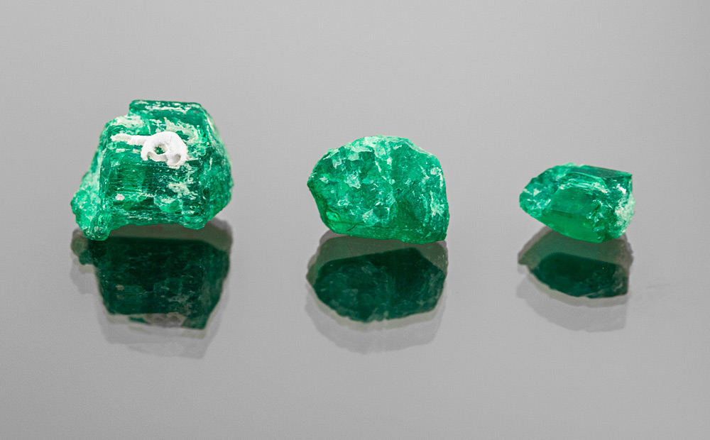 Three new Atocha rough emeralds photographed by Stephen i Studios.