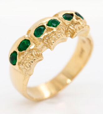 Emerald Skull Ring angle view.