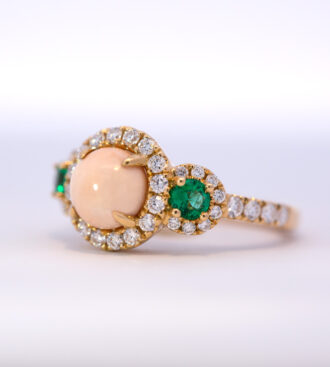 Conch pearl emerald & diamond halo ring