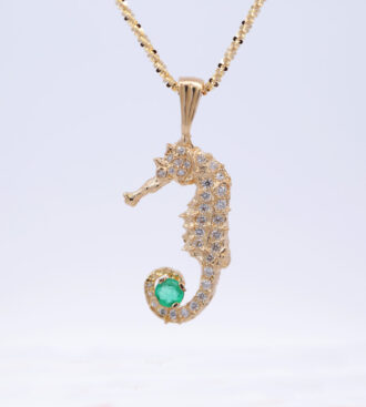 Seahorse emerald and diamond pendant