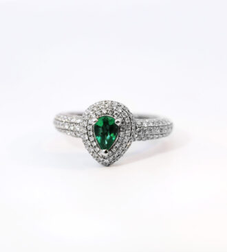 Triple halo emerald & diamond ring