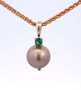 Tahitian pearl & emerald pendant in yellow gold