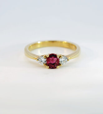 Red Beryl & diamond 3 stone engagement ring