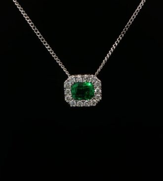 Emerald cut emerald & diamond halo pendant & chain