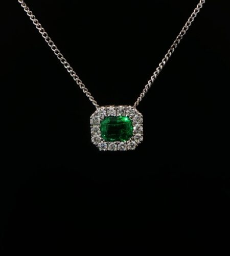 Emerald cut emerald & diamond halo pendant & chain