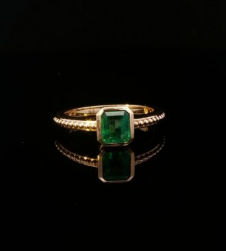 Bezel Solitaire Emerald Ring