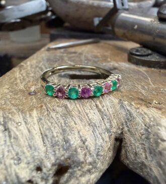 9 stone emerald & pink sapphire band ring