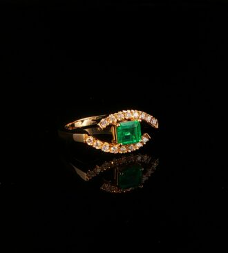 Emerald & diamond bypass ring